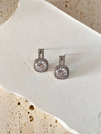 Lxalry Rhodium Moissanite Halo Earrings – Hypoallergenic, 70-Point Prism Glow, Luxury Gift for Weddings & Daily Wear